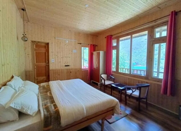 Imagen de la habitación del Hotel Hostay Tirthan. Foto 22