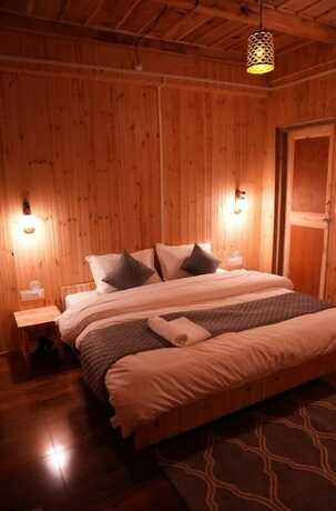 Imagen de la habitación del Hotel Hostay Tirthan. Foto 23