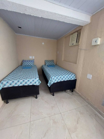 Imagen de la habitación del Hotel Hostel Bom e Familiar. Foto 6