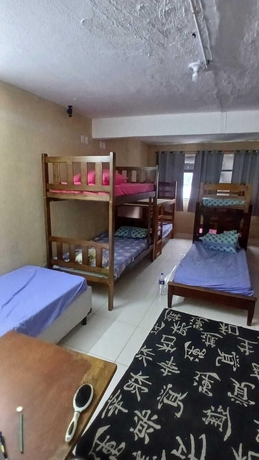 Imagen de la habitación del Hotel Hostel Bom e Familiar. Foto 13