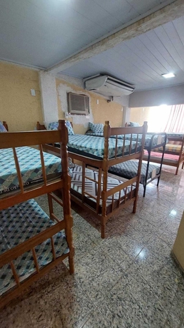 Imagen de la habitación del Hotel Hostel Bom e Familiar. Foto 16