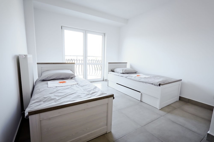 Imagen de la habitación del Hotel Hostel Orange Tree. Foto 12