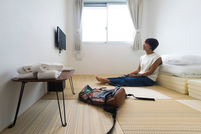 Imagen de la habitación del Hotel Hostel Sunterrace Ishigaki. Foto 6