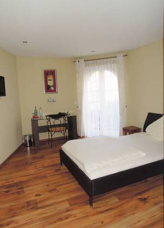 Imagen de la habitación del Hotel Hostellerie Bacher. Foto 3
