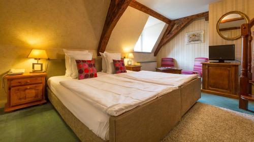 Imagen de la habitación del Hotel Hostellerie De La Pommeraie By Popinns. Foto 9