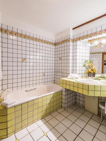 Imagen de la habitación del Hotel Hostellerie De La Pommeraie By Popinns. Foto 10