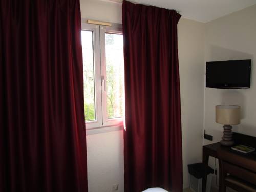 Imagen de la habitación del Hotel Hostellerie De L'abbaye. Foto 6