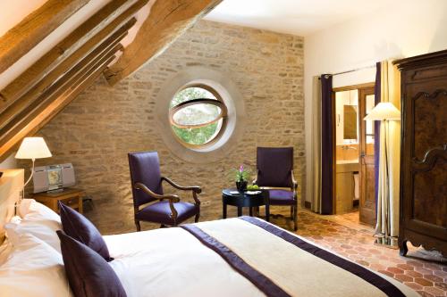 Imagen de la habitación del Hotel Hostellerie De Levernois. Foto 6