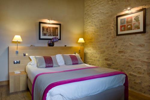 Imagen de la habitación del Hotel Hostellerie De Levernois. Foto 8