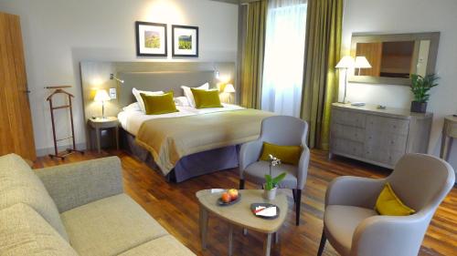 Imagen de la habitación del Hotel Hostellerie De Levernois. Foto 9