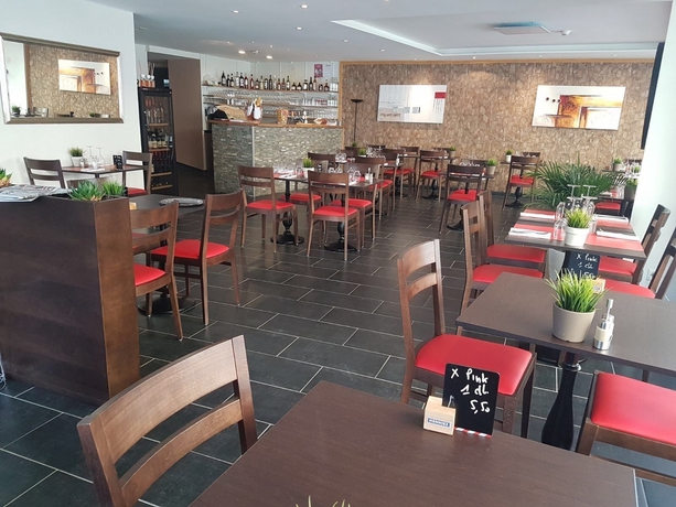 Imagen del bar/restaurante del Hotel Hostellerie De L'hotel De Ville. Foto 2