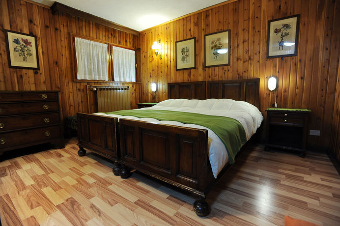 Imagen de la habitación del Hotel Hostellerie Des Guides. Foto 7