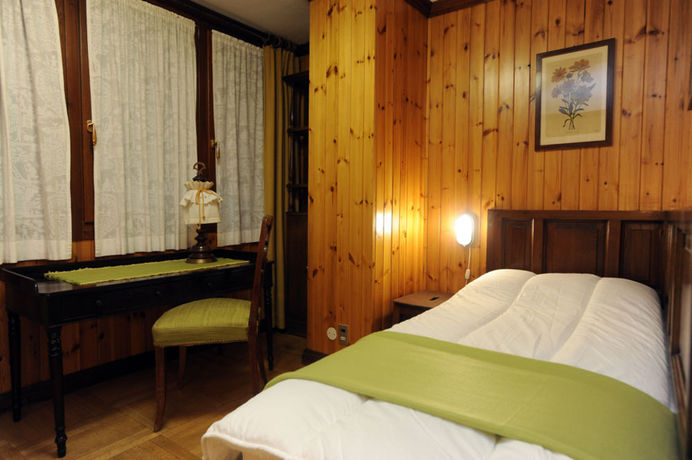 Imagen de la habitación del Hotel Hostellerie Des Guides. Foto 11