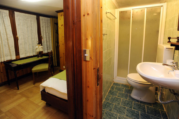 Imagen de la habitación del Hotel Hostellerie Des Guides. Foto 12