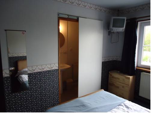 Imagen de la habitación del Hotel Hostellerie Des Tilleuls. Foto 12