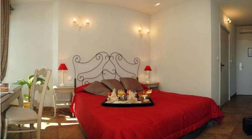 Imagen de la habitación del Hotel Hostellerie Du Cigalou, LE LAVANDOU. Foto 4