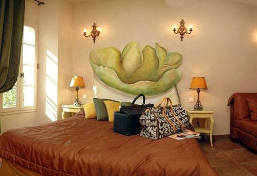 Imagen de la habitación del Hotel Hostellerie Du Cigalou, LE LAVANDOU. Foto 11