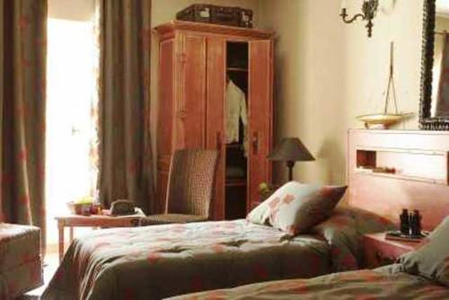 Imagen de la habitación del Hotel Hostellerie Du Cigalou, LE LAVANDOU. Foto 12