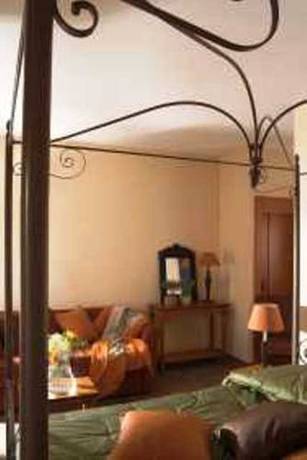 Imagen de la habitación del Hotel Hostellerie Du Cigalou, LE LAVANDOU. Foto 15