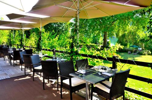 Imagen del bar/restaurante del Hotel Hostellerie Du Country Club. Foto 6