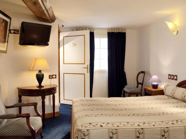 Imagen de la habitación del Hotel Hostellerie Du Grand Sully. Foto 4