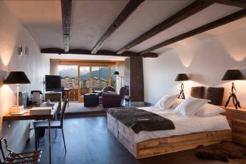 Imagen de la habitación del Hotel Hostellerie Du Pas De L'ours Relais Et Chateaux. Foto 2