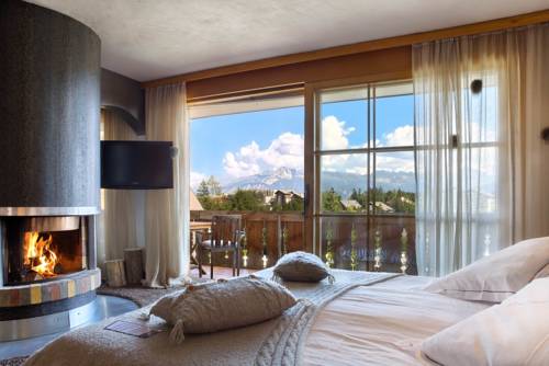 Imagen de la habitación del Hotel Hostellerie Du Pas De L'ours Relais Et Chateaux. Foto 9