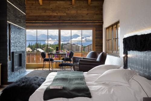 Imagen de la habitación del Hotel Hostellerie Du Pas De L'ours Relais Et Chateaux. Foto 14