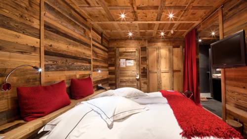 Imagen de la habitación del Hotel Hostellerie Du Pas De L'ours Relais Et Chateaux. Foto 15