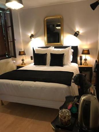 Imagen de la habitación del Hotel Hostellerie Du Vieux Cordes. Foto 5