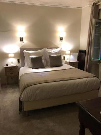 Imagen de la habitación del Hotel Hostellerie Du Vieux Cordes. Foto 6