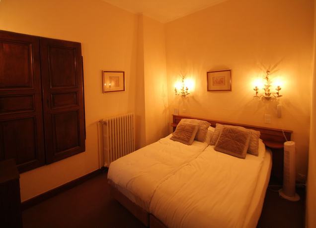 Imagen de la habitación del Hotel Hostellerie Le Beffroi, Vaison-la-Romaine. Foto 5