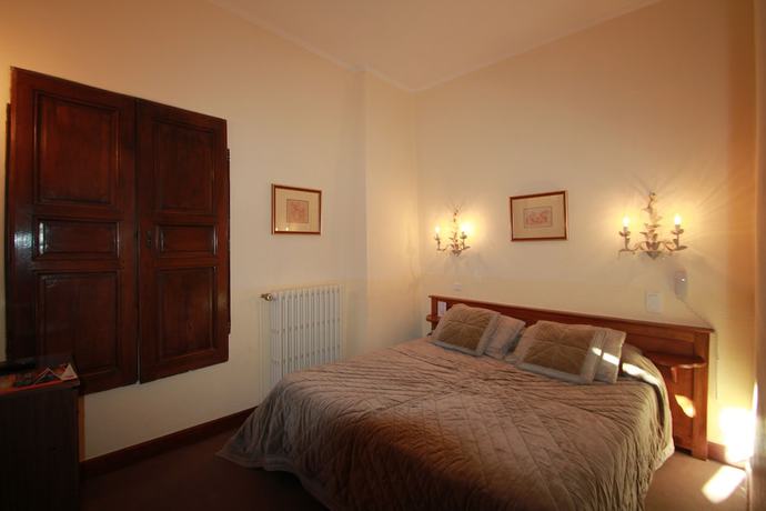 Imagen de la habitación del Hotel Hostellerie Le Beffroi, Vaison-la-Romaine. Foto 6