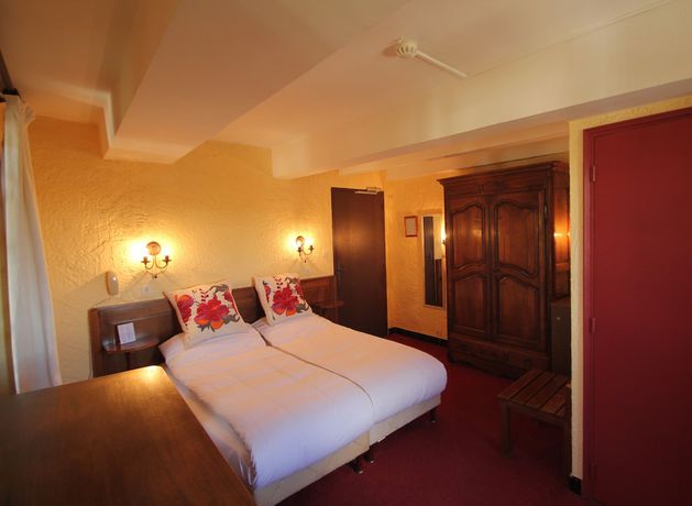 Imagen de la habitación del Hotel Hostellerie Le Beffroi, Vaison-la-Romaine. Foto 8