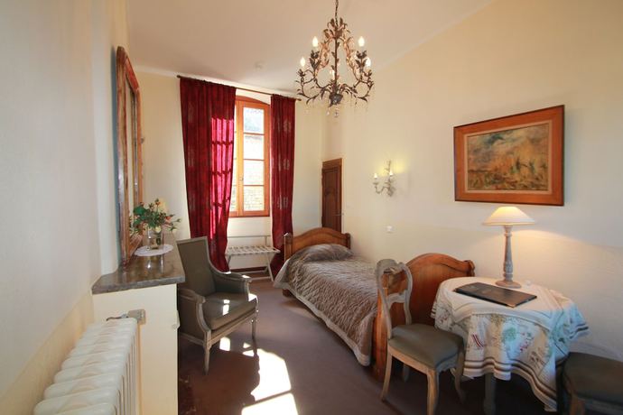 Imagen de la habitación del Hotel Hostellerie Le Beffroi, Vaison-la-Romaine. Foto 11