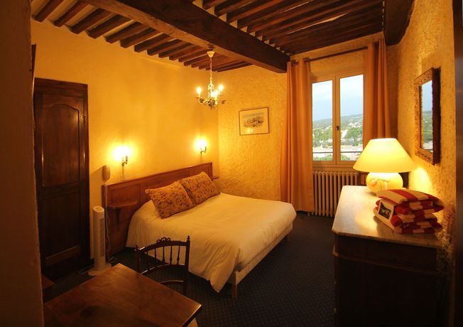 Imagen de la habitación del Hotel Hostellerie Le Beffroi, Vaison-la-Romaine. Foto 17