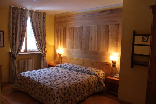 Imagen de la habitación del Hotel Hostellerie Le Lievre Amoureux. Foto 10