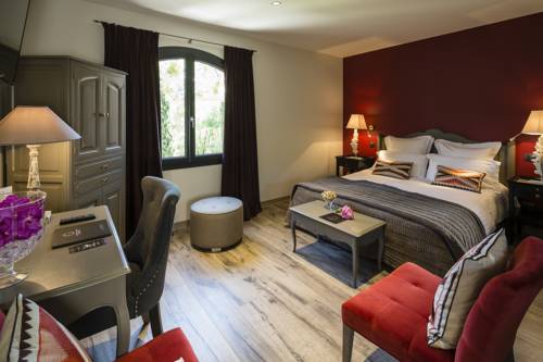 Imagen de la habitación del Hotel Hostellerie Les Gorges De Pennafort. Foto 15