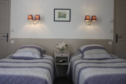 Imagen de la habitación del Hotel Hostellerie Les Griffons. Foto 7