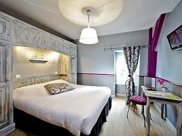 Imagen de la habitación del Hotel Hostellerie Maleville. Foto 8