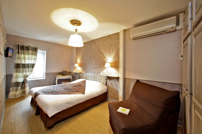 Imagen de la habitación del Hotel Hostellerie Maleville. Foto 11