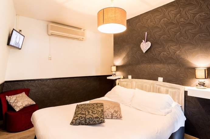Imagen de la habitación del Hotel Hostellerie Maleville. Foto 13