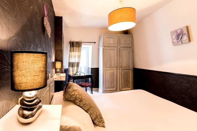 Imagen de la habitación del Hotel Hostellerie Maleville. Foto 14