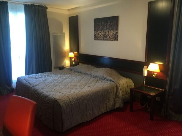Imagen de la habitación del Hotel Hostellerie Saint-Vincent. Foto 17