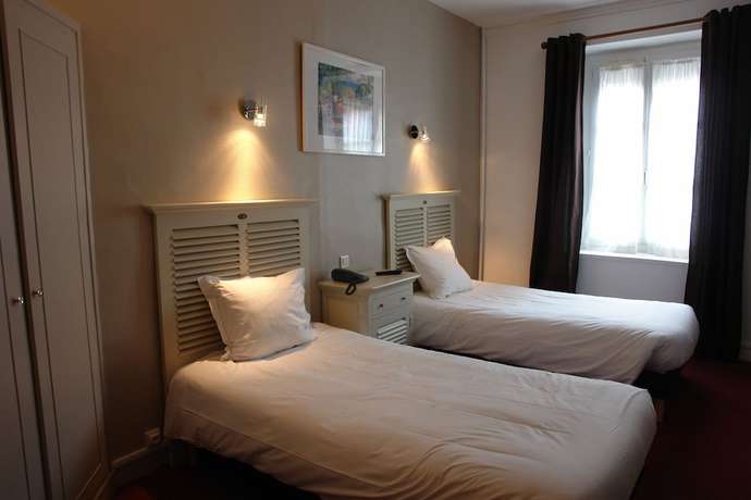 Imagen de la habitación del Hotel Hostellerie de la Porte Bellon. Foto 7