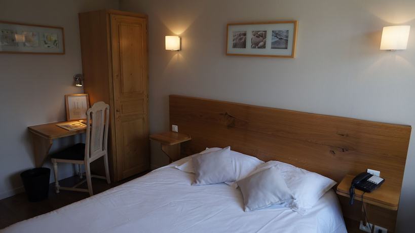 Imagen de la habitación del Hotel Hostellerie de la Porte Bellon. Foto 12