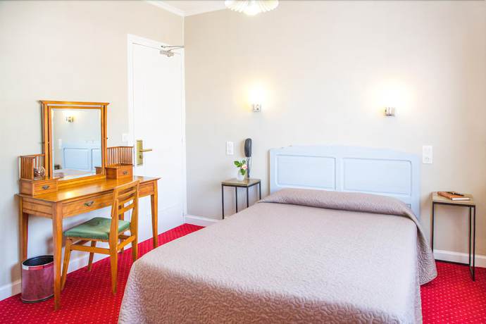 Imagen de la habitación del Hotel Hostellerie de la Roseraie. Foto 11