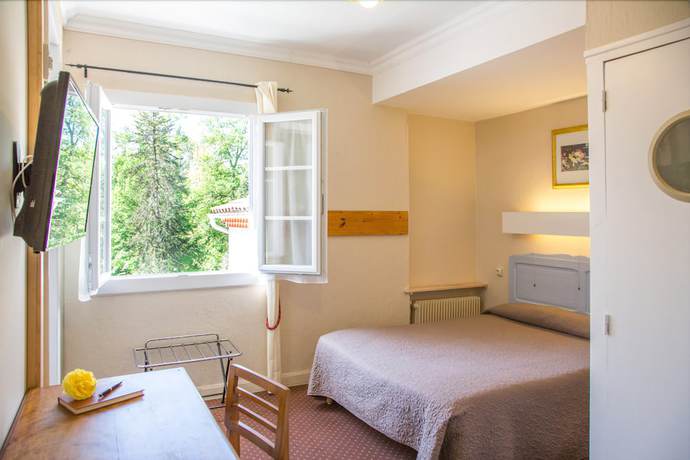 Imagen de la habitación del Hotel Hostellerie de la Roseraie. Foto 13