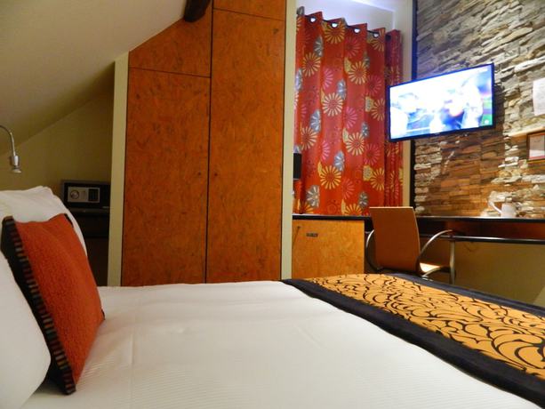 Imagen de la habitación del Hotel Hostellerie du Ch&acirc;teau, Eguisheim. Foto 5