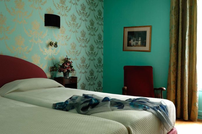 Imagen de la habitación del Hotel Hostellerie du Moulin des Ruats. Foto 11